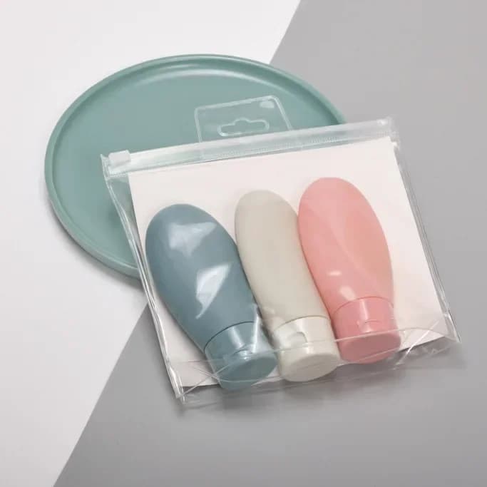 Kit de bouteilles rechargeables de voyage compact et portable pour essence, shampoing et nettoyant p